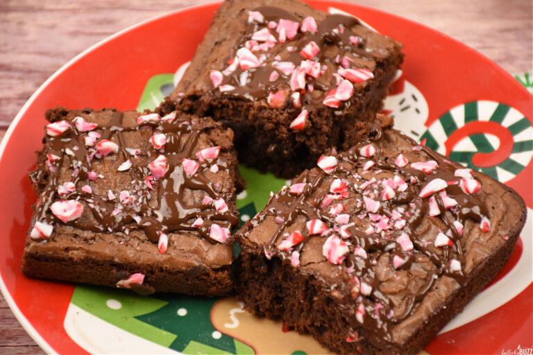 close up of chocolate peppermint brownies on a holiday plate