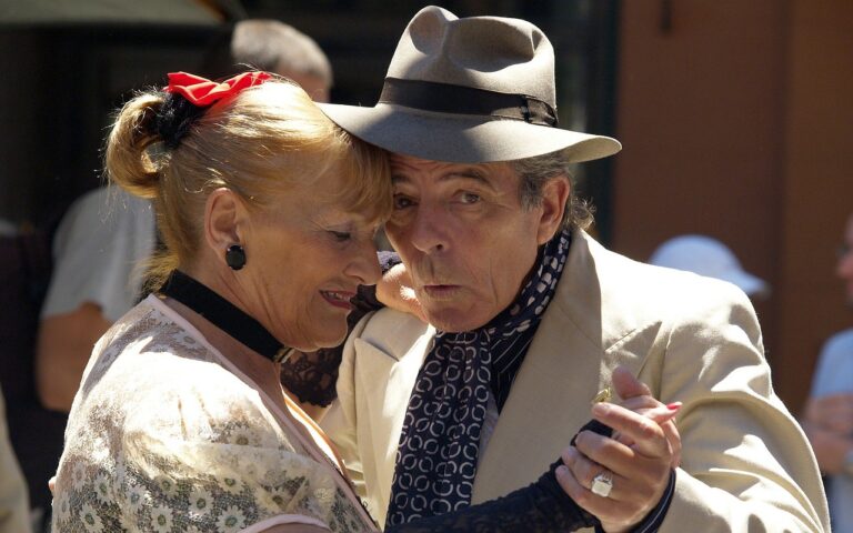 older couple danging together as part of positive aging