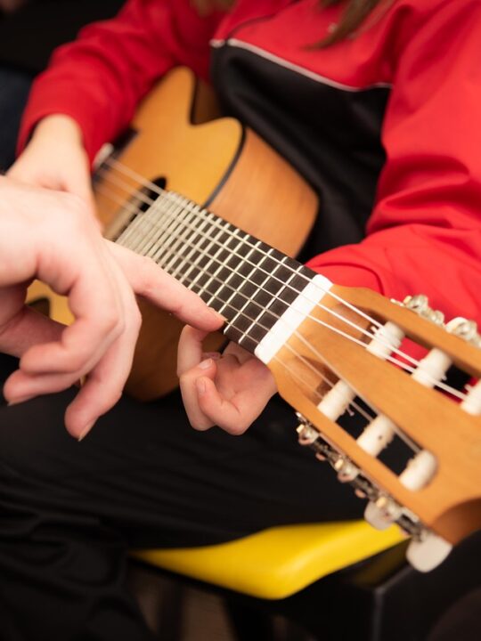 takelessons.com can help you find guitar lessons for your child