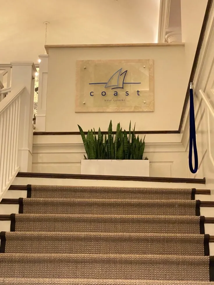 stairs leading to Coast Restaurant at The Beach Club Resort and Spa