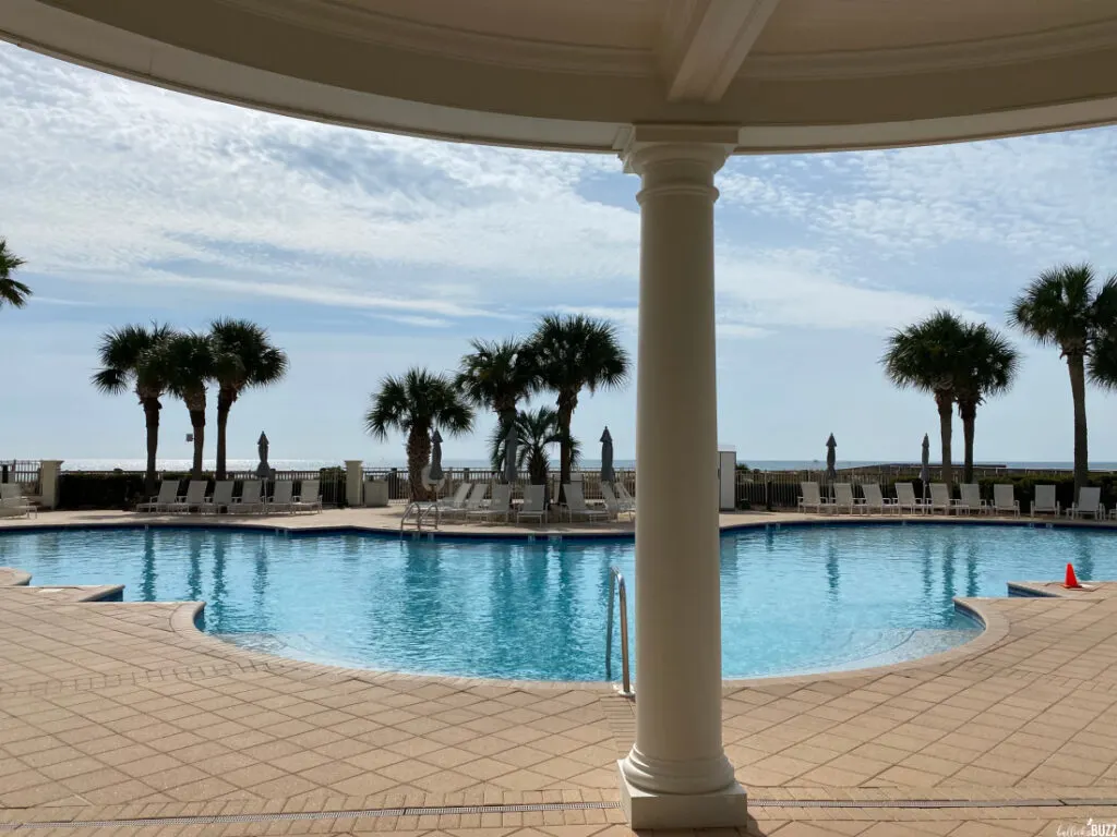 an outdoor pool at beach club resort