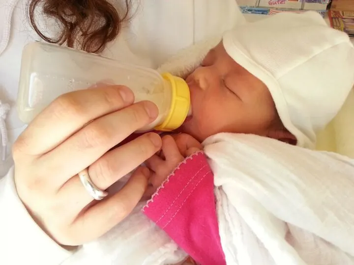 baby being bottle fed