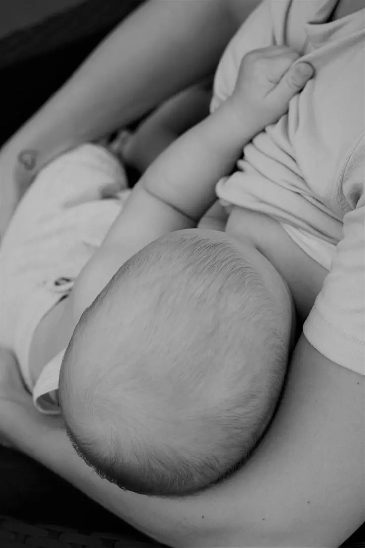 woman breastfeeding for the first time