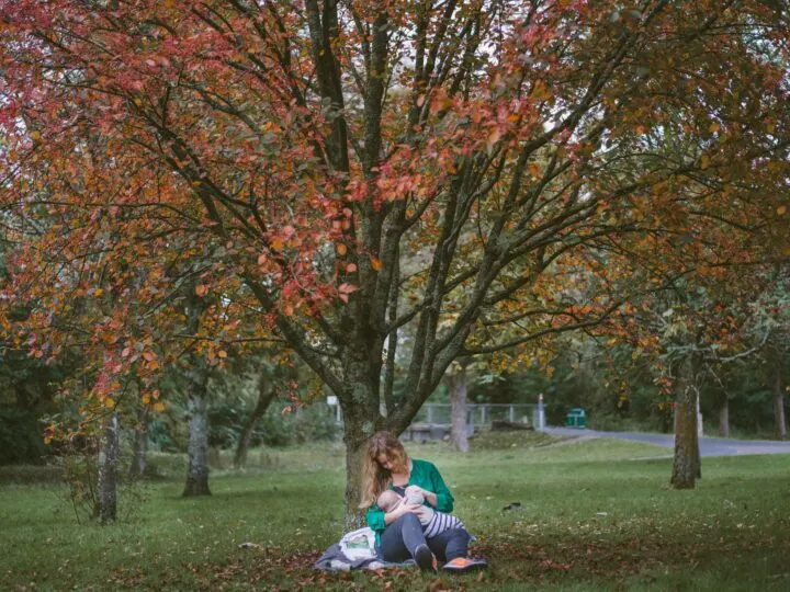 woman breastfeeding for the first time in public