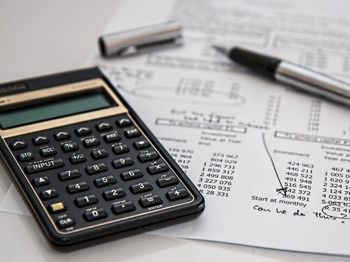 financial toolkit tools calculator and pen and paper