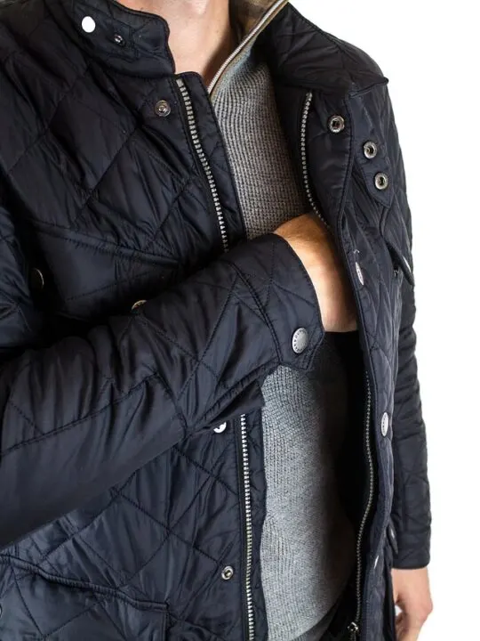 man wearing black leather jacket