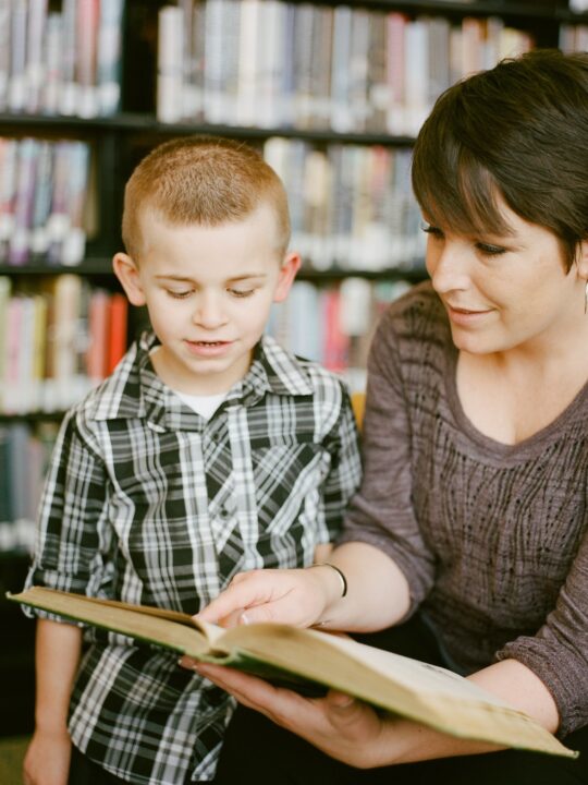 mom studying with child to find time to study as a mom