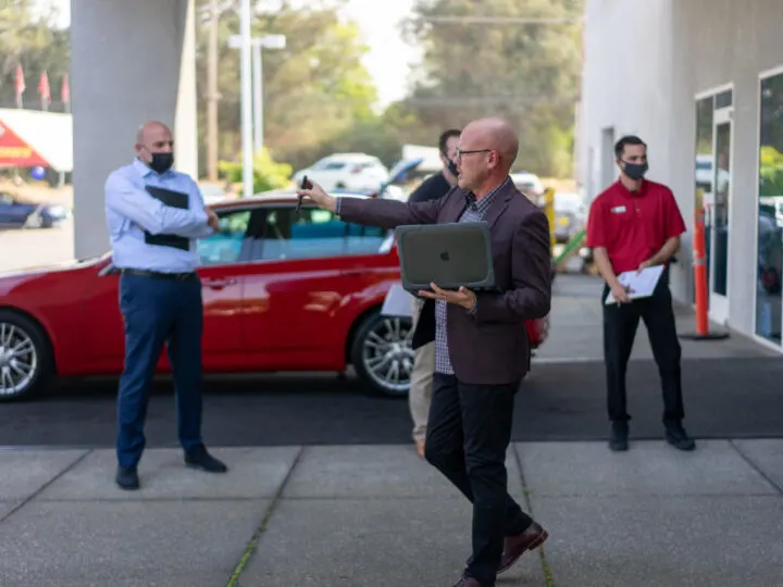 negotiating with a car dealer salesman