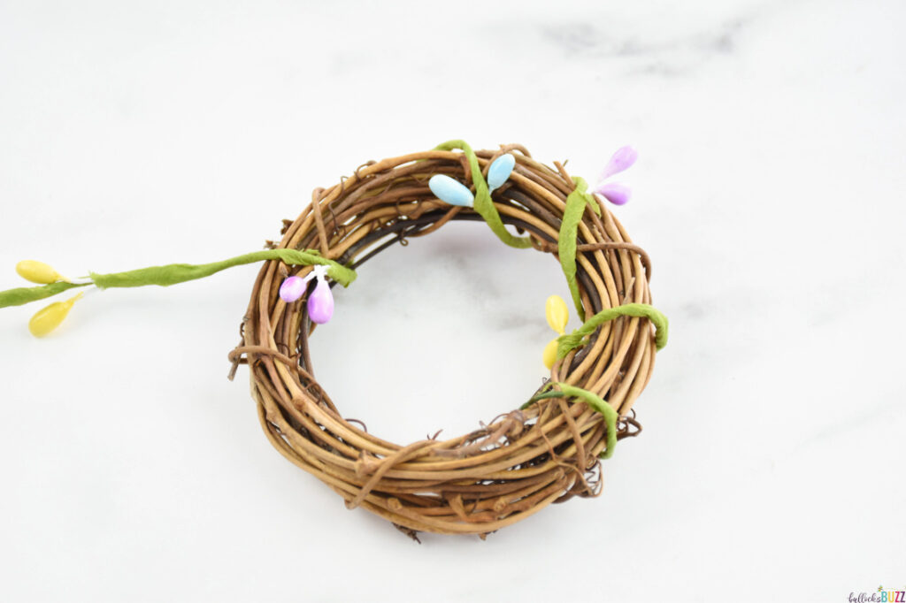 wrap the wire seed garland around the wreath form
