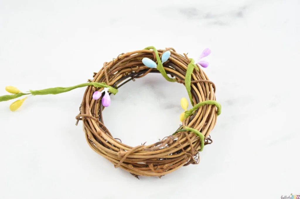 wrap the wire seed garland around the wreath form