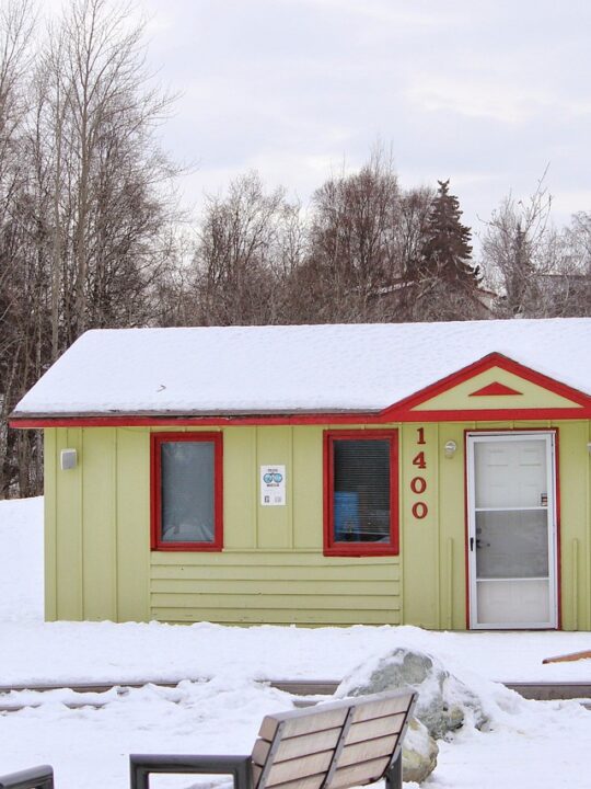 house covered in snow covered by home warranties in Alaska