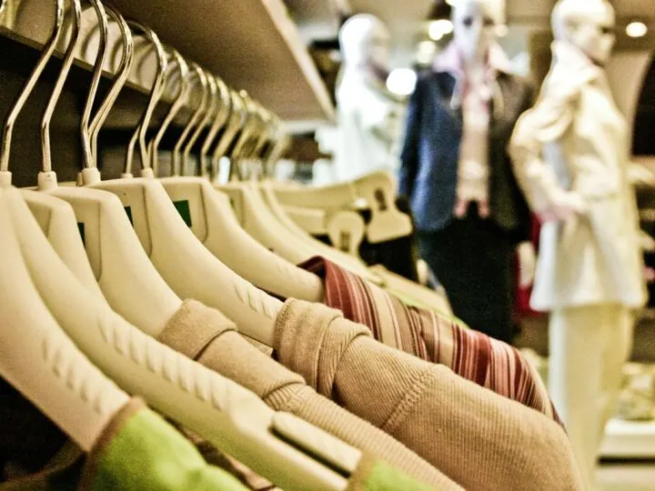 clothing on a rack in an ethical fashion store