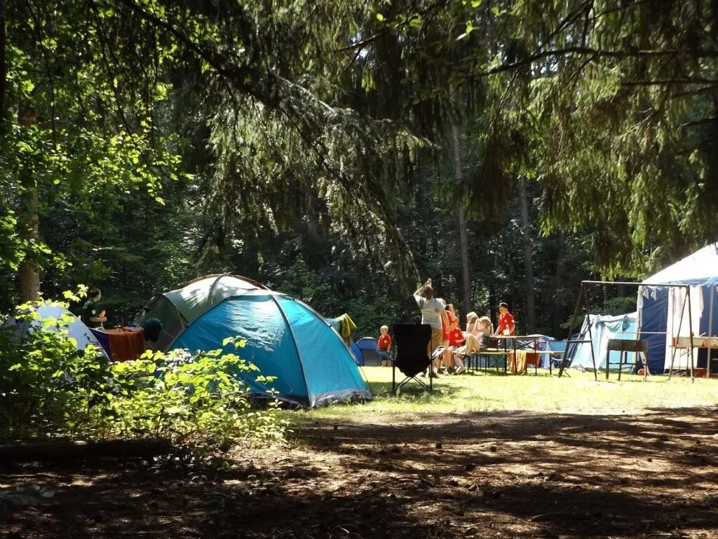 family-friendly weekend activities include camping like this family is doing