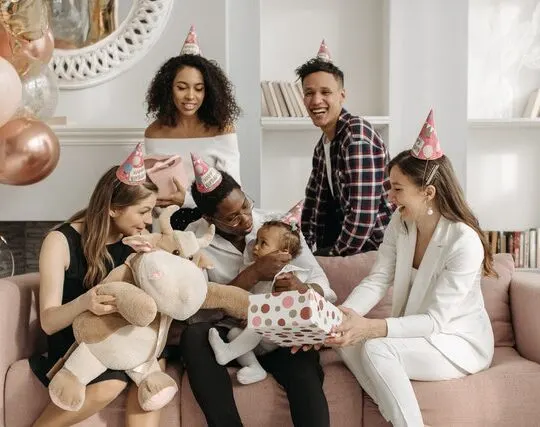 celebrating a baby girl's first birthday