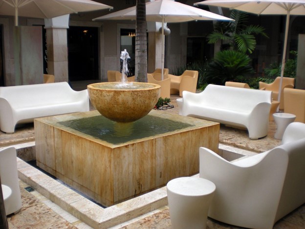 add a water feature like this one is another of our minimalist garden ideas