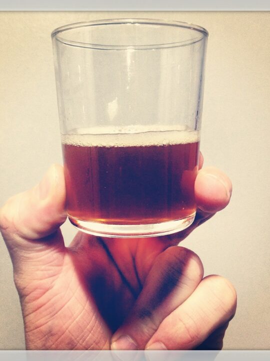 homemade beer in a glass and 3 common homebrewing problems