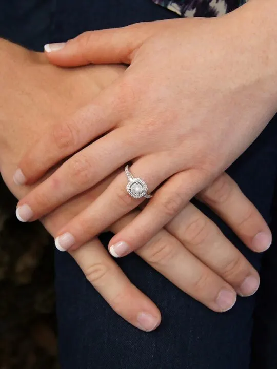 diamond engagement ring on hands
