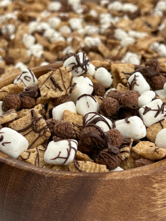 s'more snack mix in wooden bowl