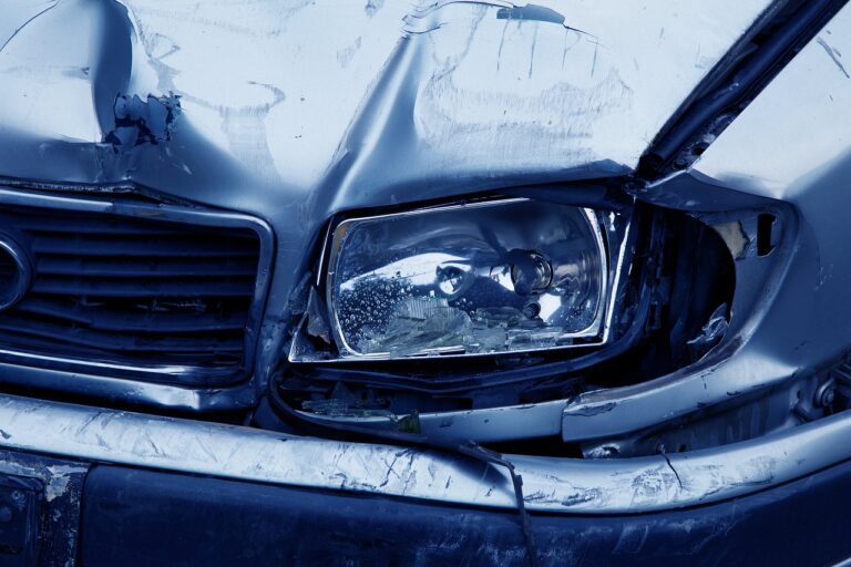wrecked car due to one of the common causes of Uber accidents