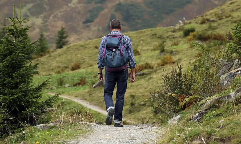 man hiking as one of his weekend hobbies