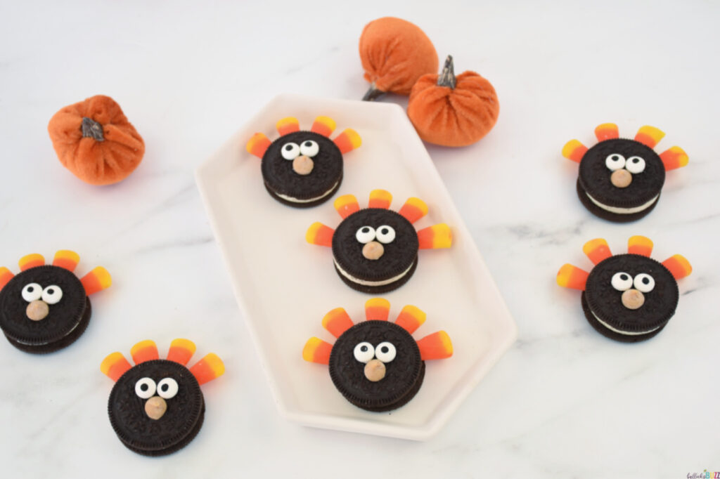 a tray of Oreo Turkeys on a table surrounded by more of the easy Thanksgiving Treats