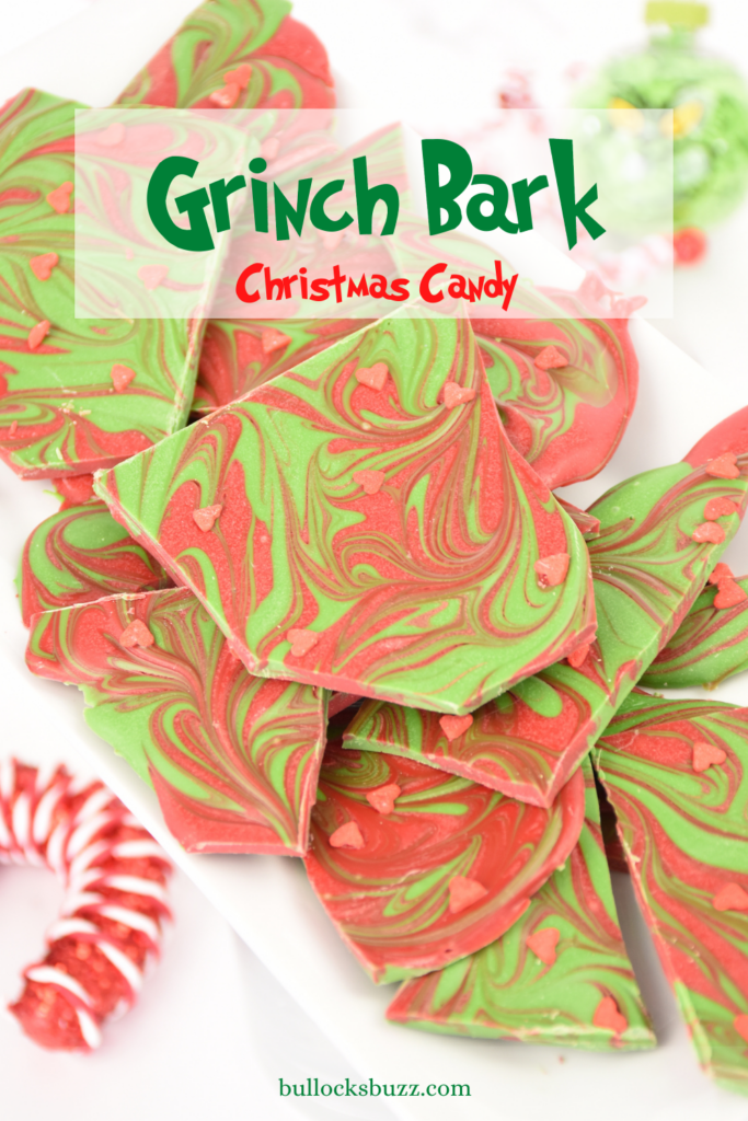 Red and green swirled Grinch Bark Christmas Candy on white plate