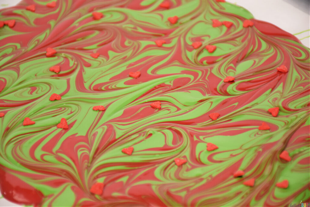 add small candy hearts to grinch bark