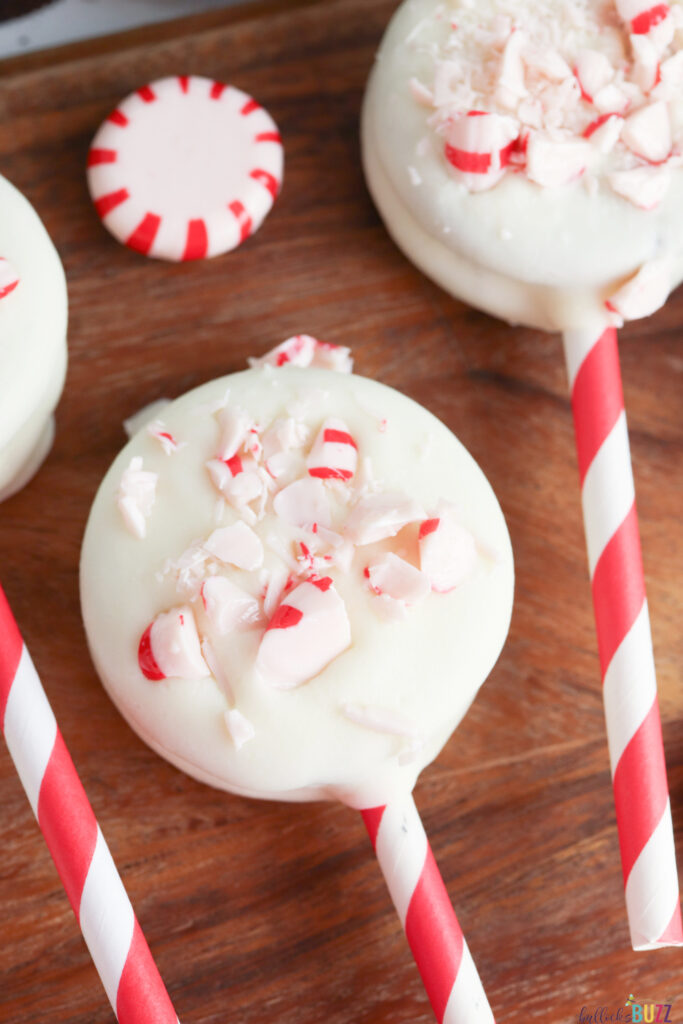 crushed peppermint on white chocolate covered Oreo