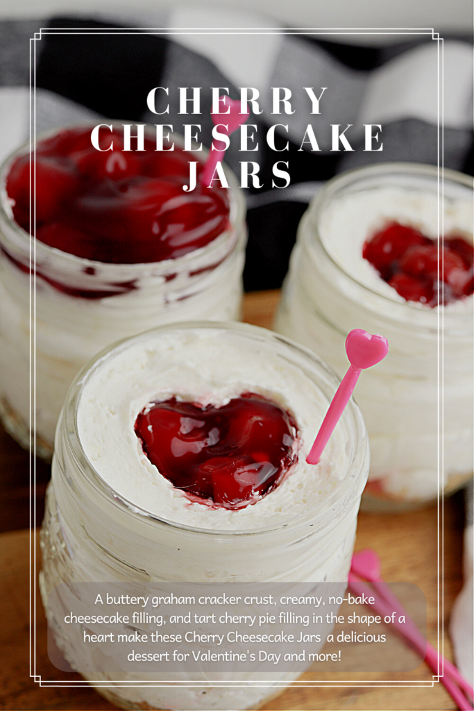 Three cherry topped cheesecakes in jars 