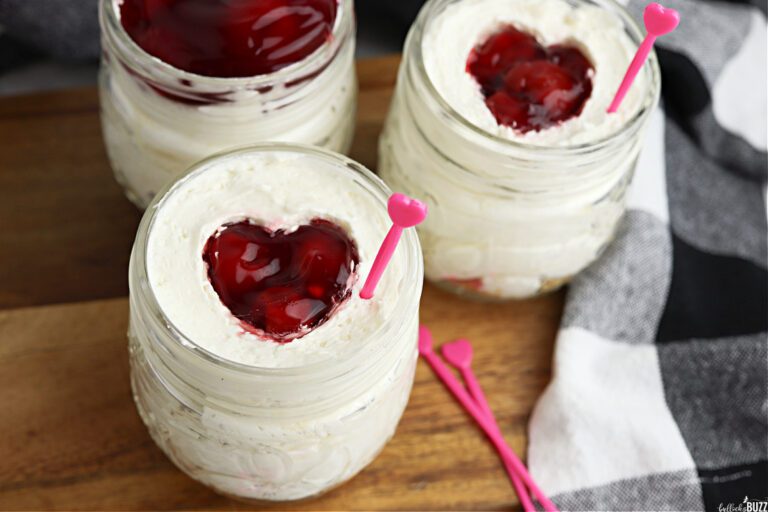 cherry cheesecake jars on cutting board