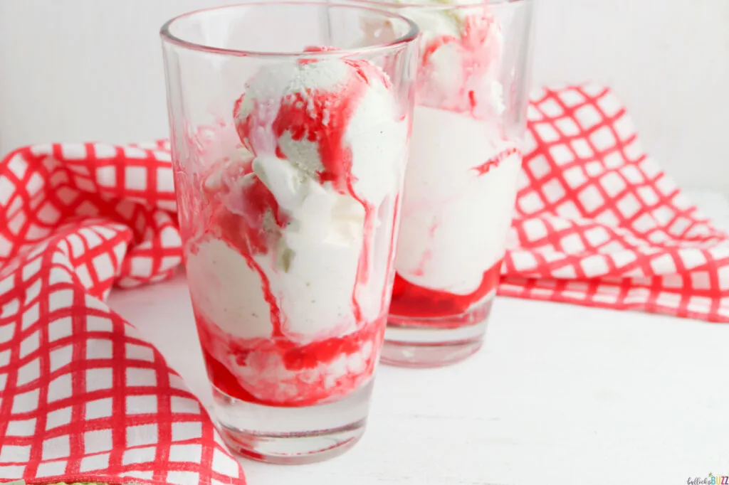 vanilla ice cream added to the glasses 