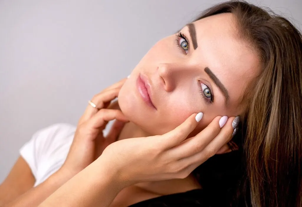 close up of a woman's skin that is still youthful from her trying ways to improve tissue regenration within the skin