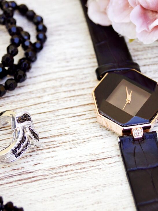 an elegant black watch with a silver and black ring are the type of jewelry for every occasion