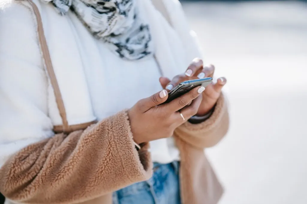 woman using her smartphone