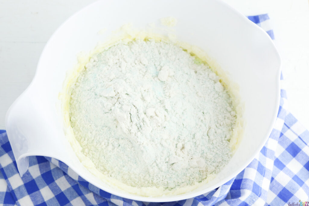 combine the wet ingredients with the dry ingredients to form dough
