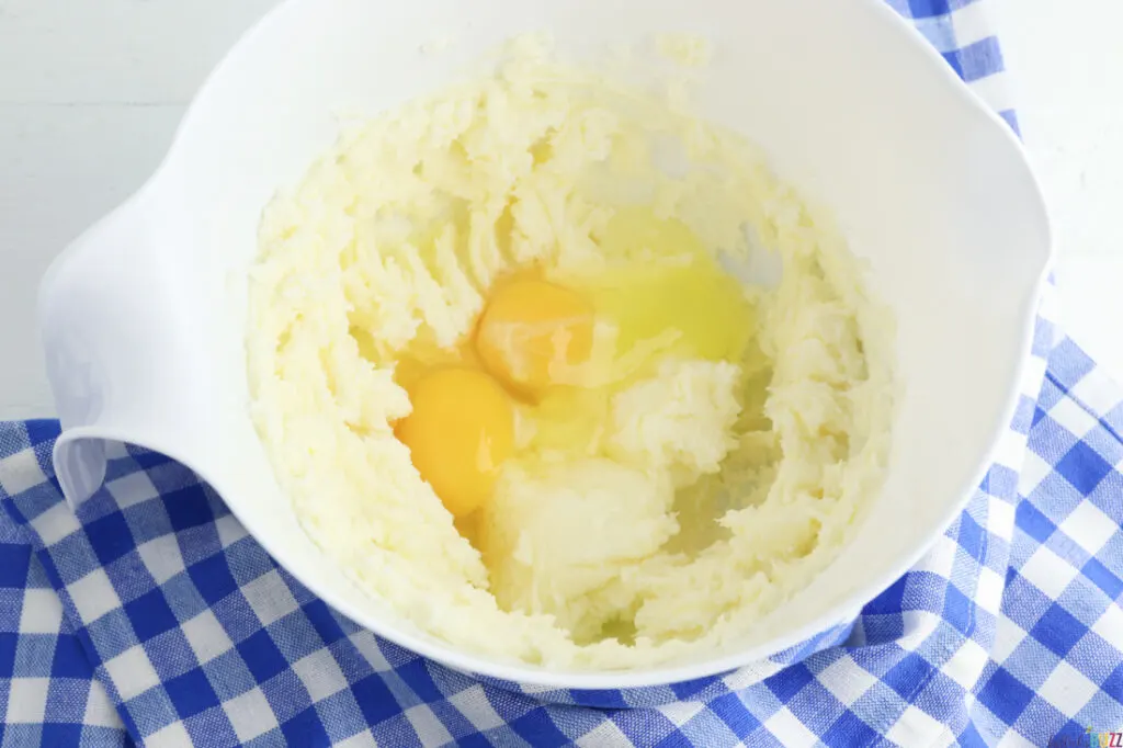 add the eggs to the creamed butter and sugar mixture