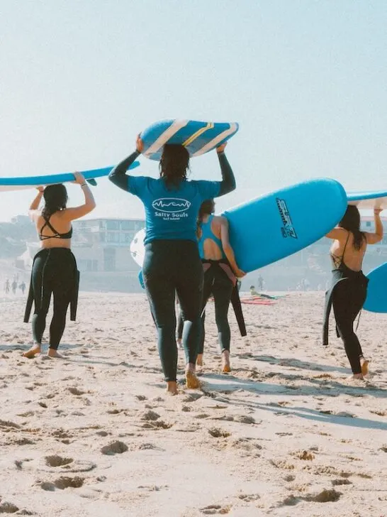 one of the may uses of neoprene include the wetsuits these surfers are wearing