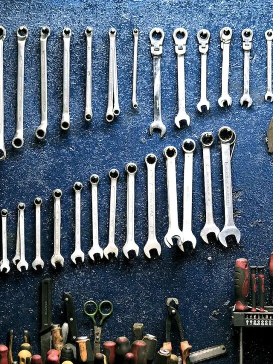 keeping your tools on a dedicated organized workbench like this one is one of the best ways to organize your garage
