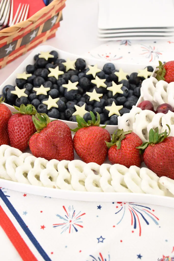 overhead image of fruit arranged in an American Flag shaped tray for a 4th of July fruit trat idea