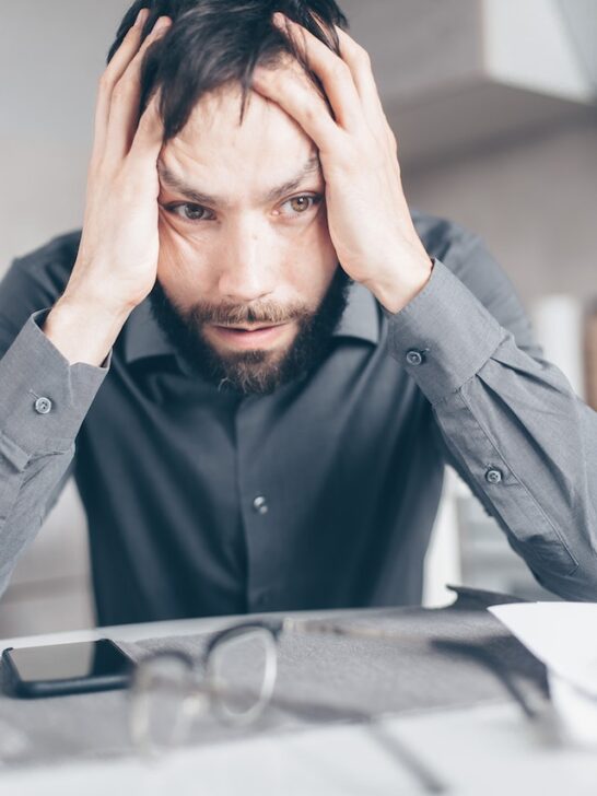 stressed-out man worried needing an accounts receivable tool to help recover debt