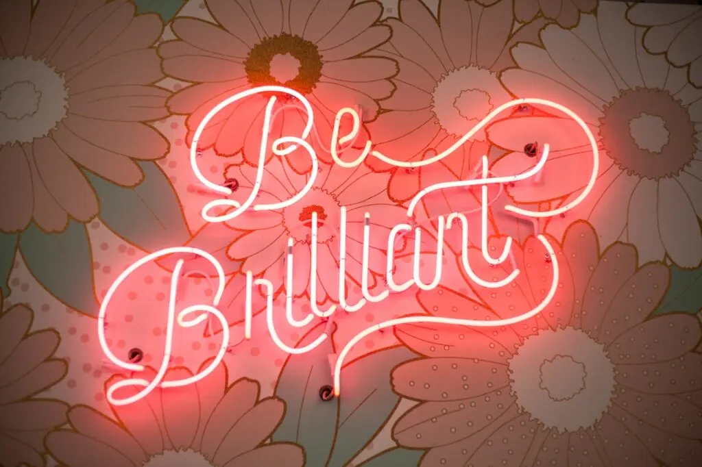 neon signs are a popular part of interior design. This one says be brilliant