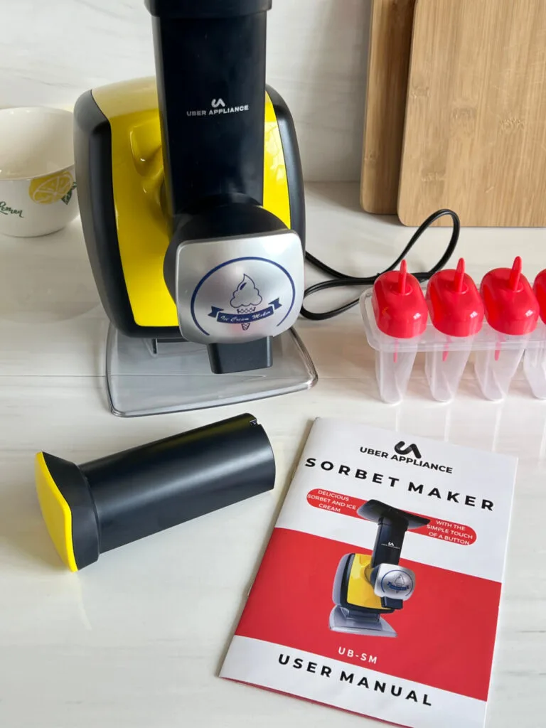 everything that comes with the Uber Appliance Sorbet Maker including the machine, popsicle molds, and user manual