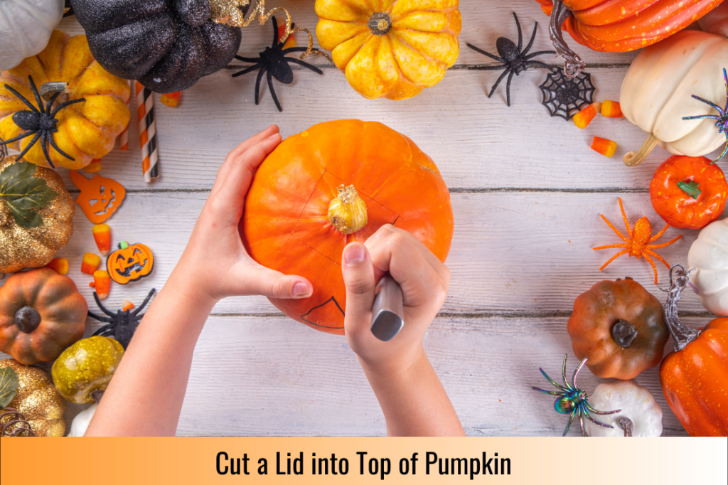 using a knife to cut a lid out of the top of the pumpkin as part of learning hoe to carve a pumpkin