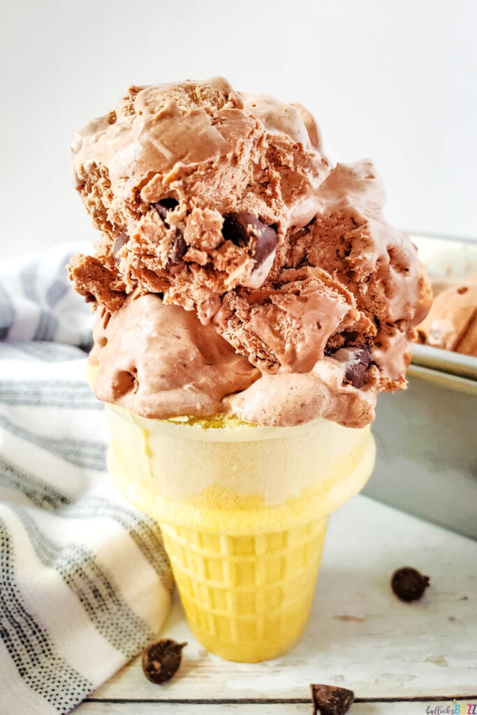 large scoop of no churn rocky road ice cream on a cone