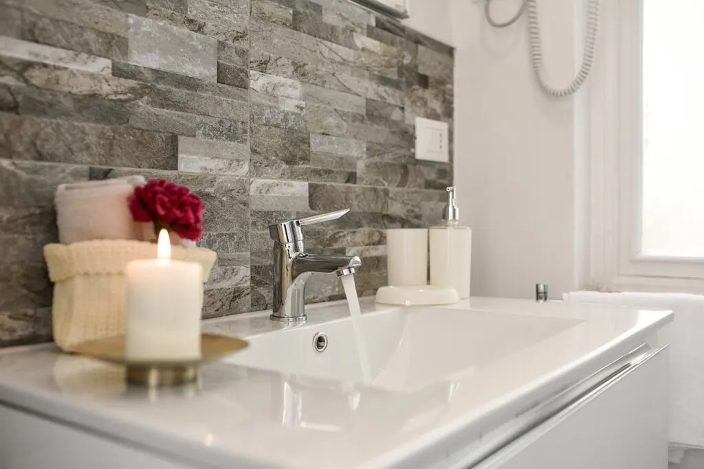 aromatherapy candles on a bathroom countertop