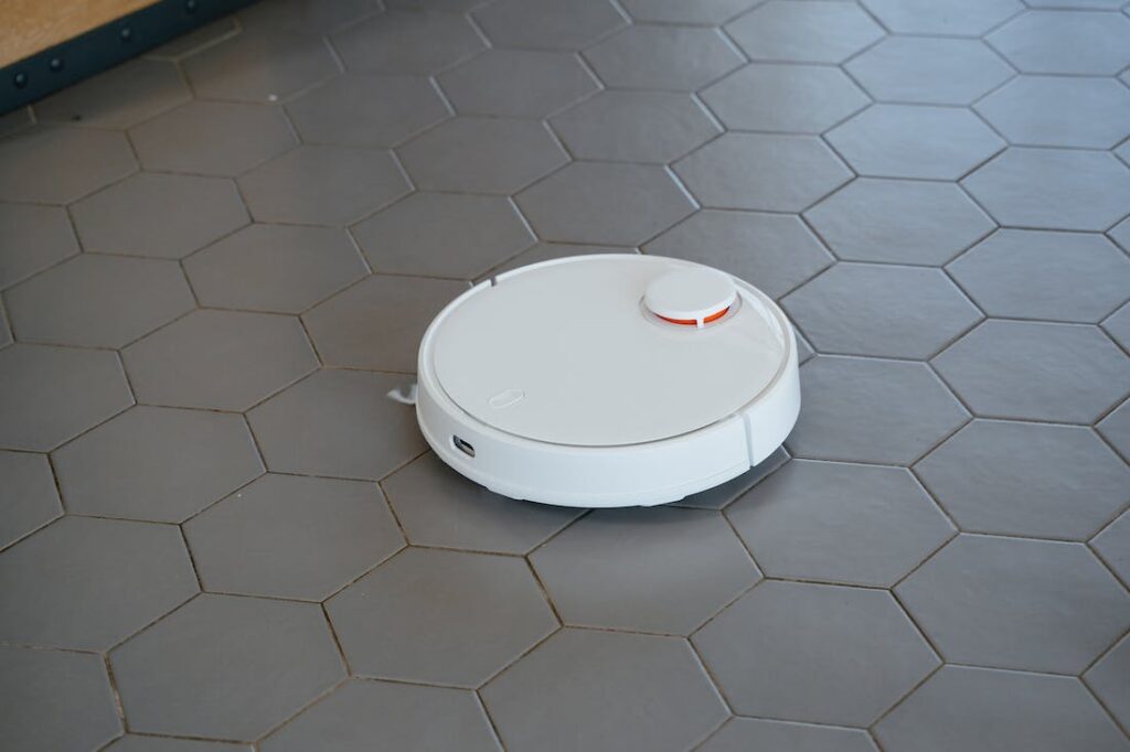 This robot vacuum cleaning a tile floor is just one example of the evolution of home appliances.