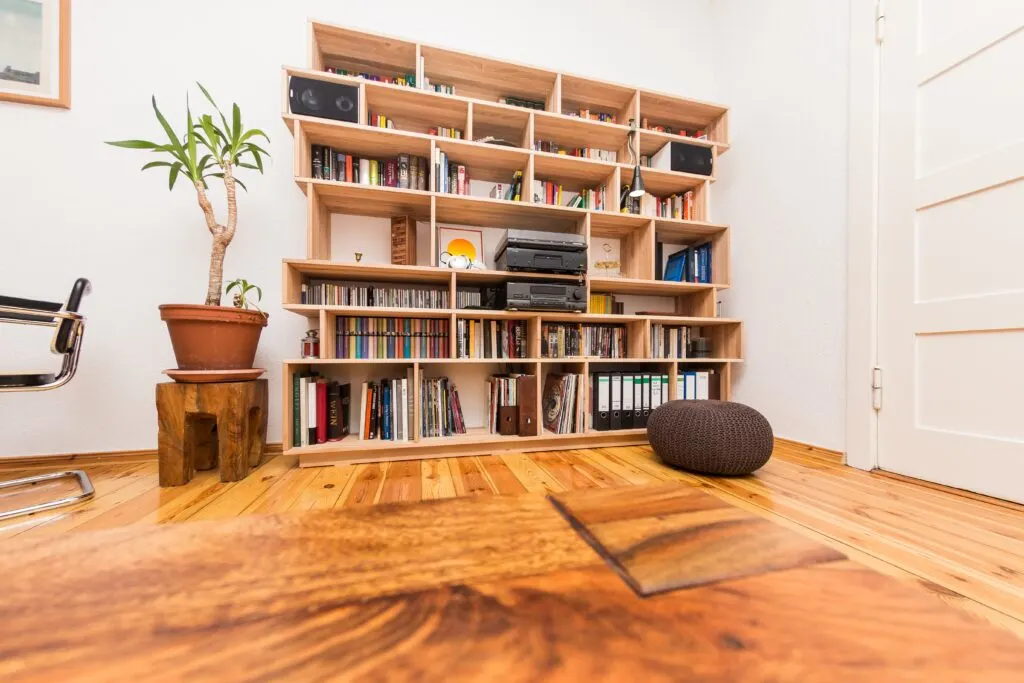 A bookcase used for storage illustrates one of the important roles of new furniture in home renovation.