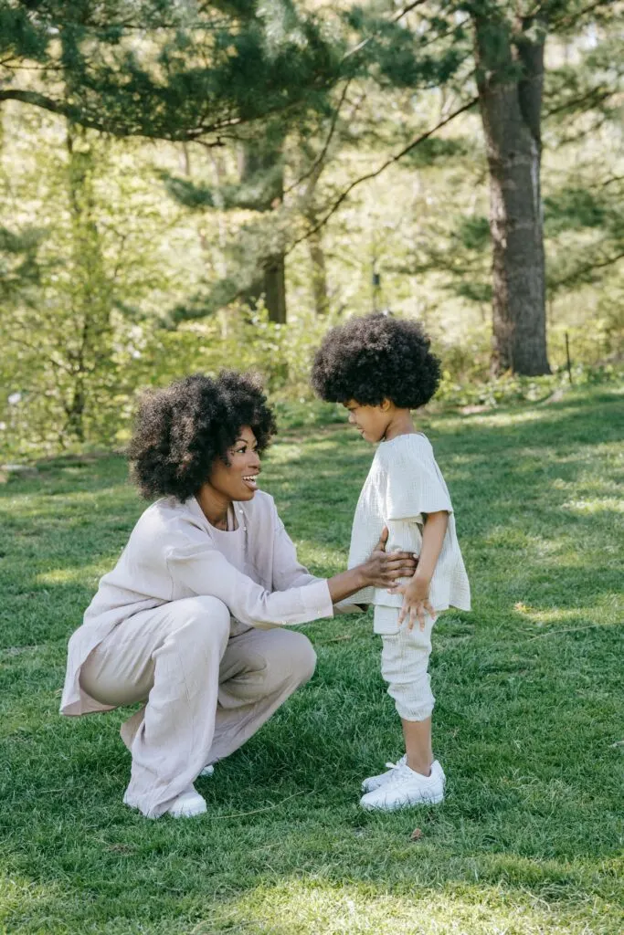 A mom talking to her child using techniques to help your kids learn articulate their thoughts.