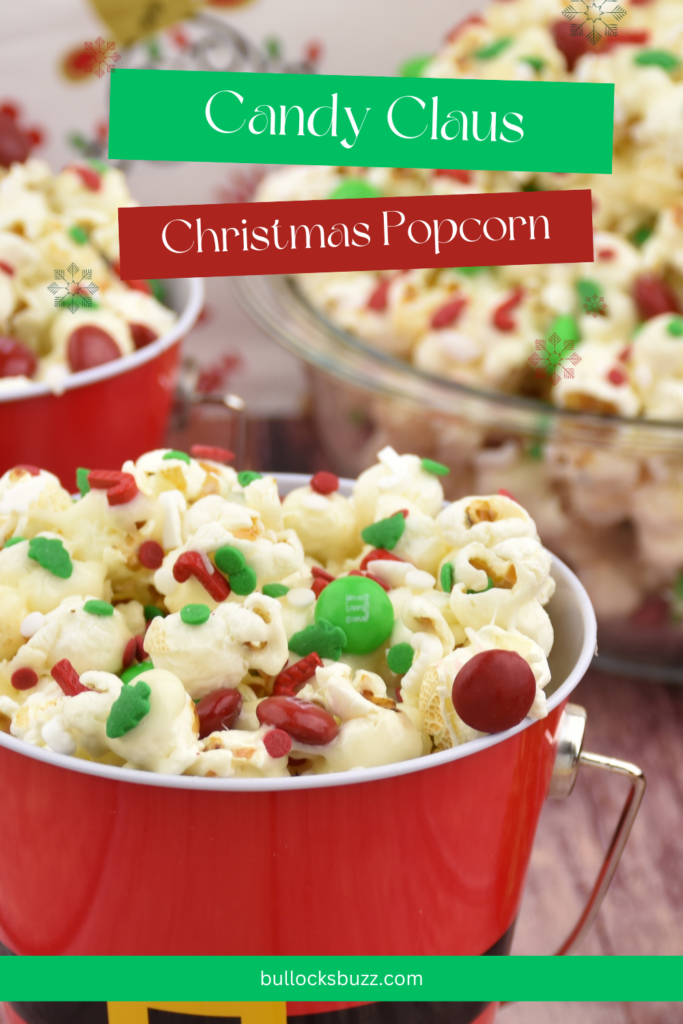 A red tin filled with Candy Claus Christmas Popcorn - marshmallow-covered popcorn with red and green candies and sprinkles