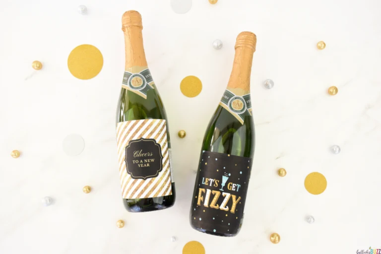 Two bottles with the printable New Years Eve wine bottle labels set against a white background